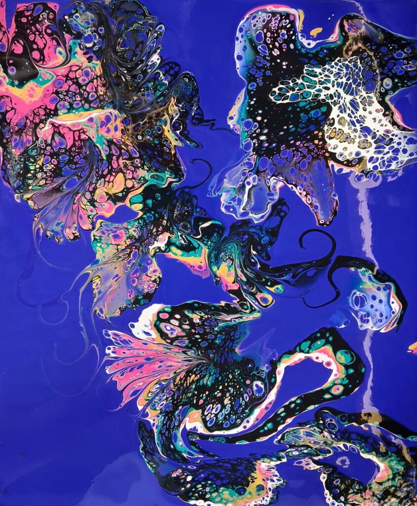 An acrylic Dutch pour painting with a vibrant blue background.