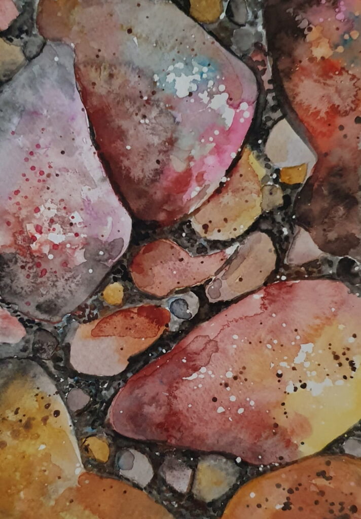 A watercolour painting of river pebbles.