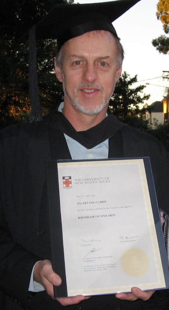A photo of Stuart Ian Currie during graduation ceremony for Visual Arts from UniNSW, 2008
